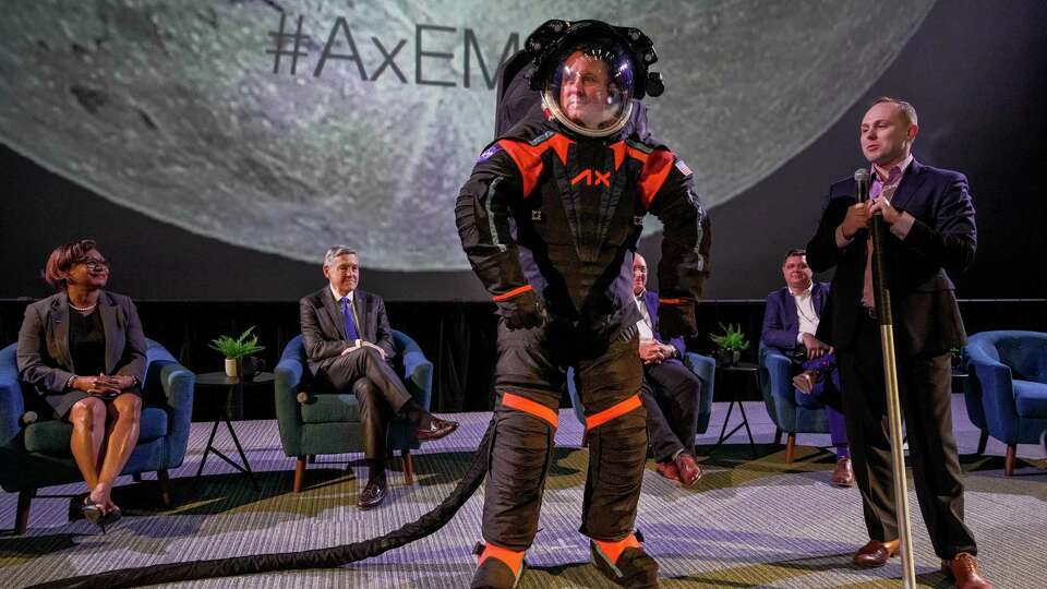 Axiam Space EVA Chief Engineer, Jim Stein demonstrates a new spacesuit developed by houston-based company Axiom Space for NASA's Artemis program, which aims to send astronauts back to the moon on Wednesday March 15, 2023 in Houston.