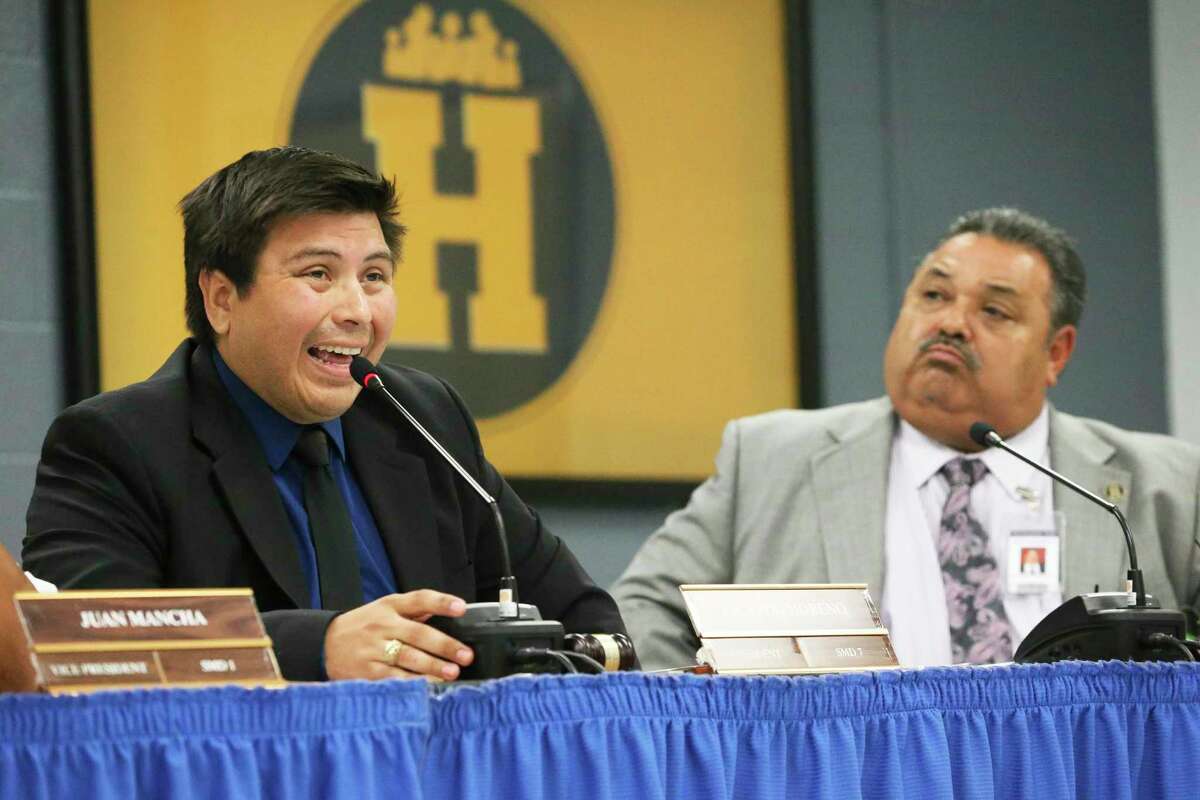 Harlandale ISD board president Ricardo Moreno reads from a prepared text refuting the findings of a TEA investigation as Superintendent Rey Madrigal listens on June 13, 2019. Madrigal was ousted that year and the board managed to avoid a state takeover.