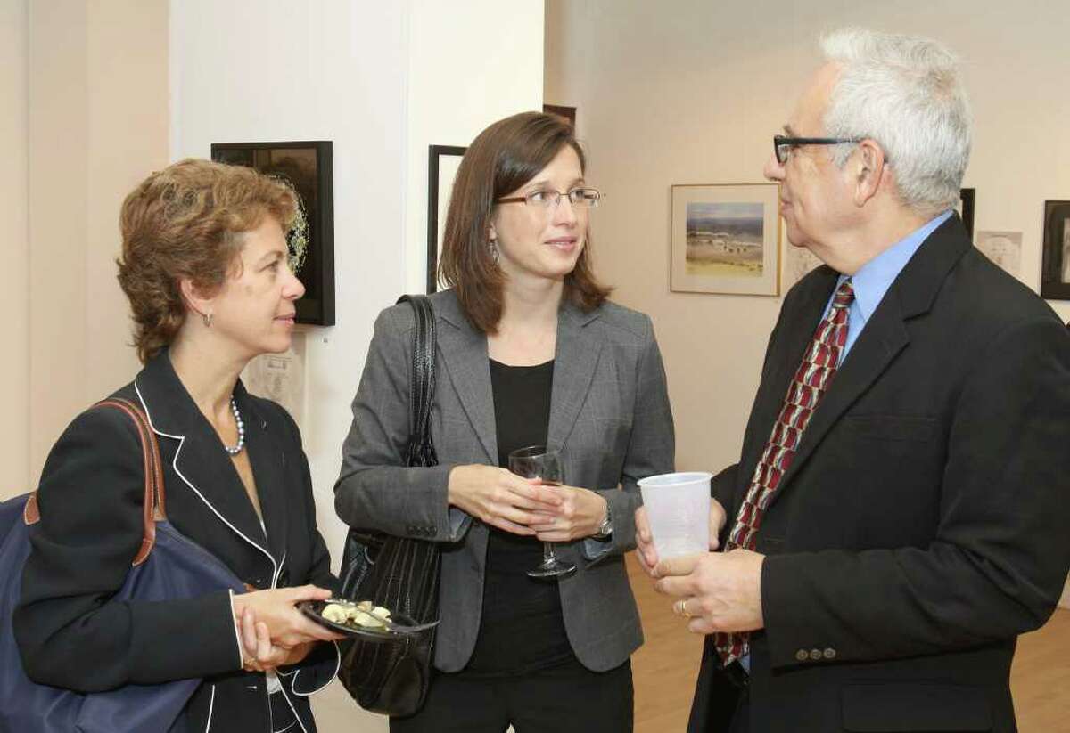 Troy, NY - September 30, 2010 - (Photo by Joe Putrock/Special to the Times Union) - (l to r) Marybeth Labate, Kimberly Lamay and David Neustadt talk during the 6th Annual Art Saves Animals, an art auction and reception to benefit the Mohawk & Hudson River Humane Society.