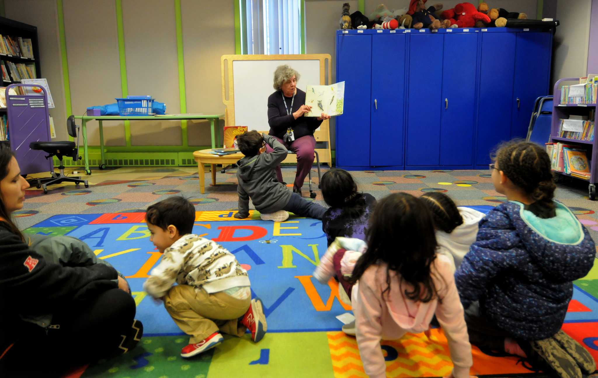 At Danbury Library storytime, children 'fly like a bird'