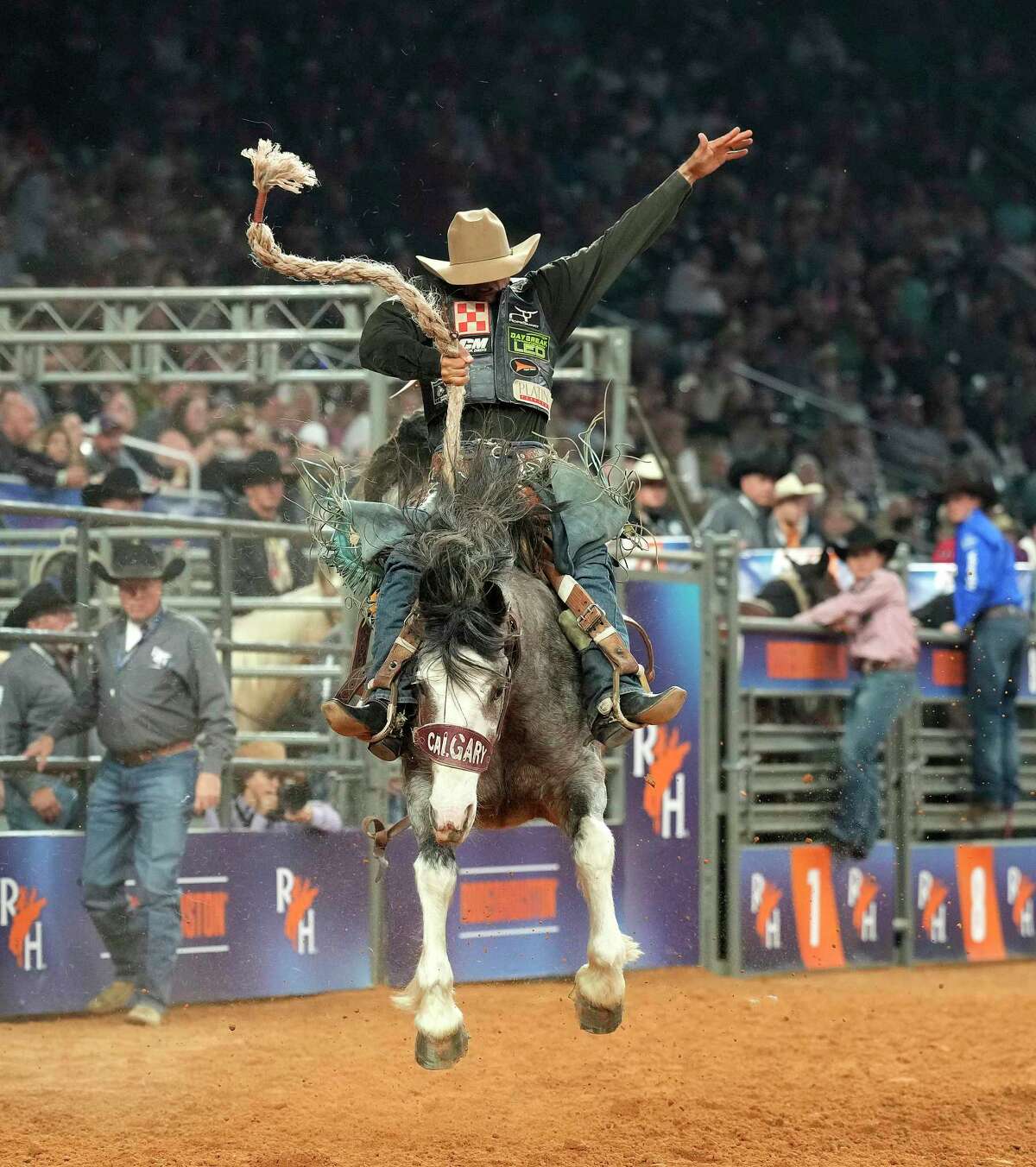 Isaac Diaz rides Dandy Delight to take first place in the saddle bronc riding competition during Semifinal 1 during Rodeo Houston at the Houston Livestock Show and Rodeo at NRG Stadium on Wednesday, March 15, 2023 in Houston.