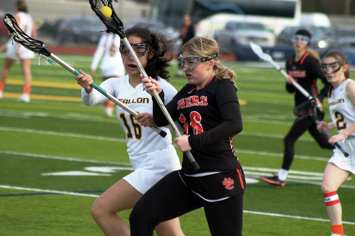 Edwardsville senior Reese Noll attacks on offense during the Tigers' 20-4 loss to O'Fallon in the program's first-ever IHSA lacrosse game on Wednesday. Noll scored four gaols for EHS. 