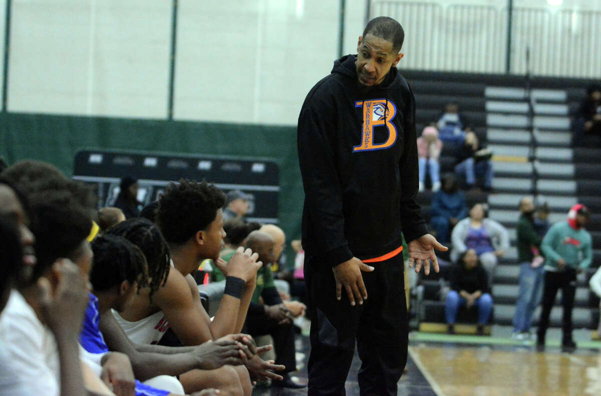 Bloomfield coach Brooks Sales talks to his players late in the fourth quarter during the CIAC Division III boys basketball semifinals at New Haven's Floyd Little Athletic Center Wednesday.
