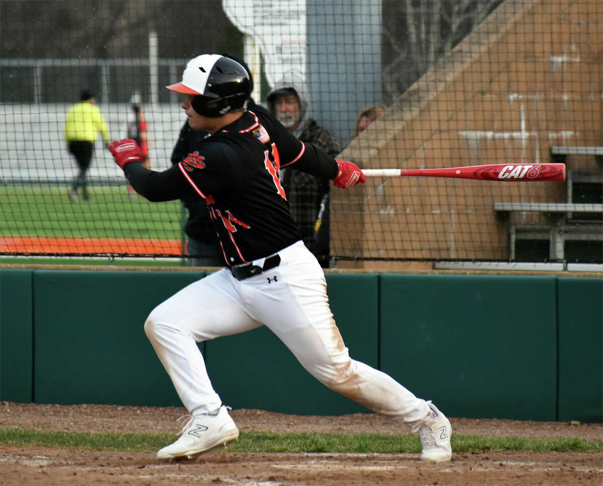 Edwardsville's Caeleb Copeland rips an RBI single during the fifth inning against St. Joseph-Ogden on Wednesday at Tom Pile Field in Edwardsville.