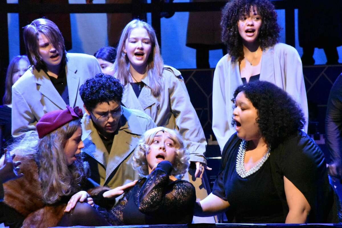 Students hit the stage for Chicago at Brien McMahon High School photo