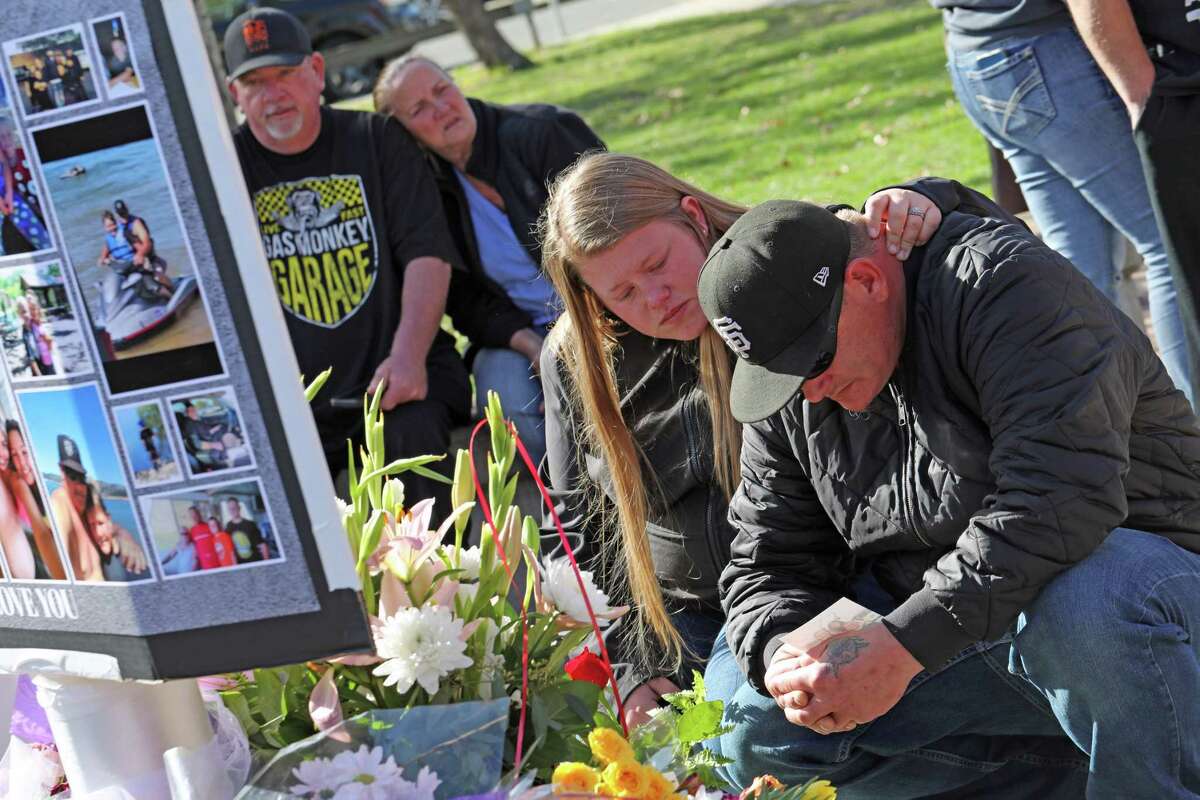 Travis Pienta (right) is comforted during a memorial for his son, Jayden Pienta, at Montgomery High School in Santa Rosa on March 2. Jayden Pienta, 16, was killed in a stabbing during a fight inside a classroom.