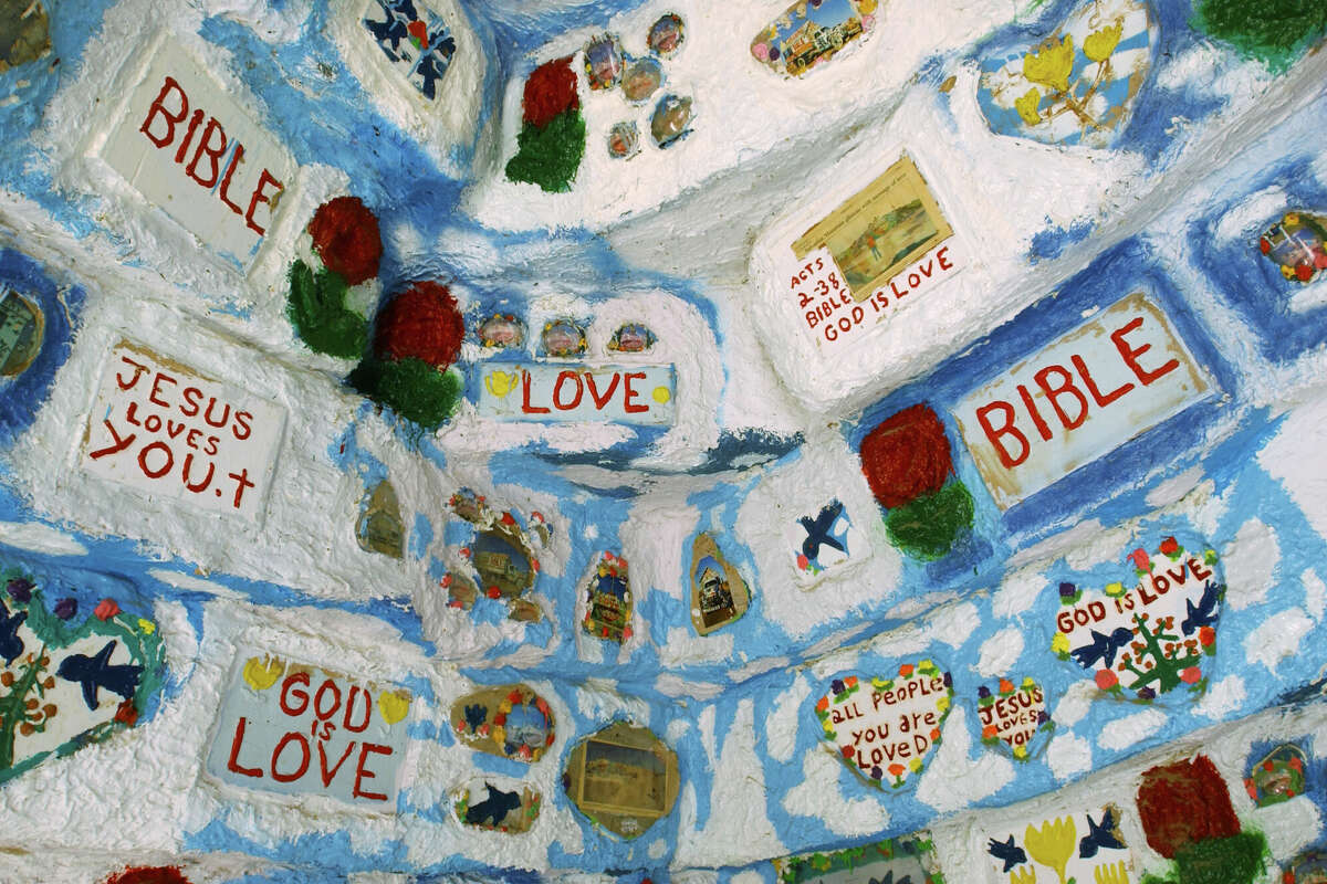 Christian designs adorn a staw bale and adobe "igloo" near Salvation Mountain May 30, 2002 near Niland, CA, east of the Salton Sea.