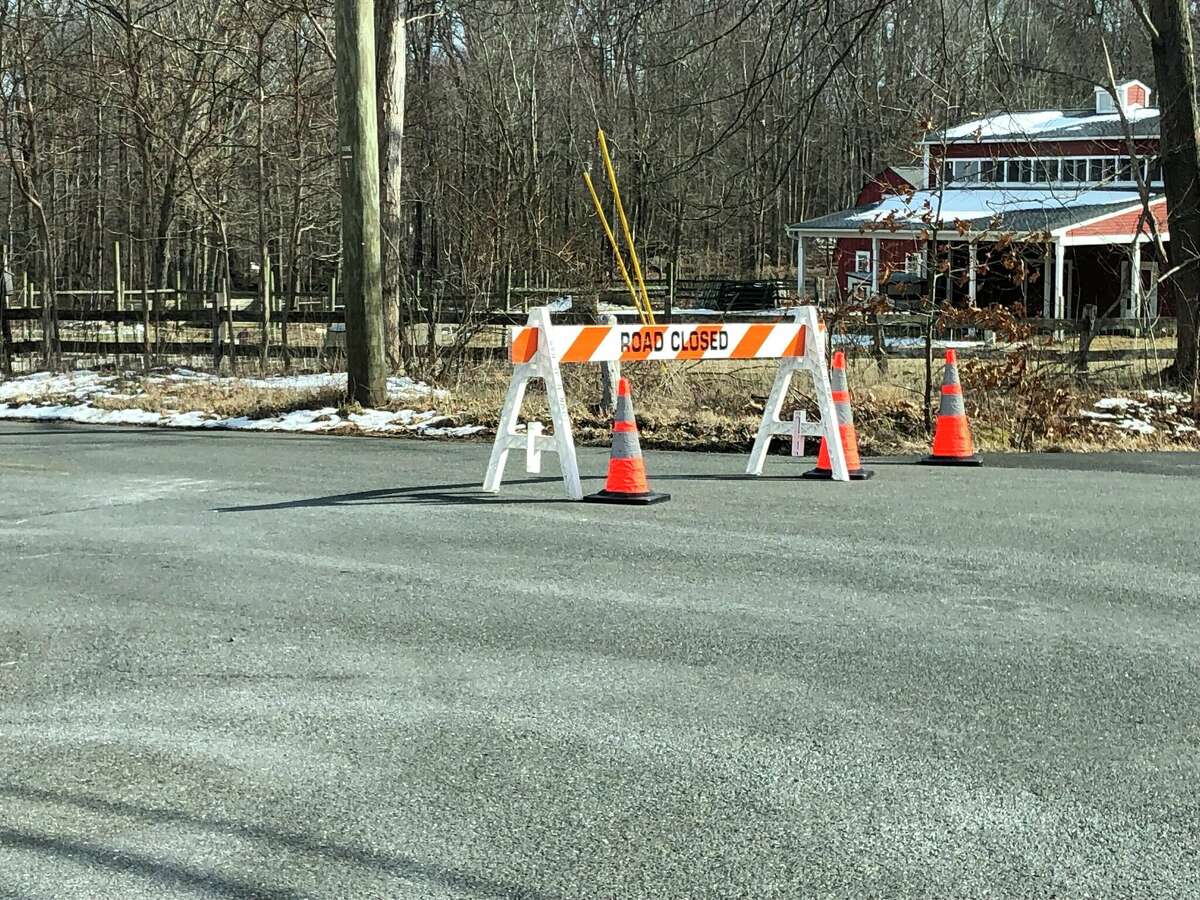 Road closure signs could be seen at the intersection of Hatfield Hill and Sperry roads Thursday afternoon, preventing drivers from getting onto Route 69 where a serious crash occurred that morning. 