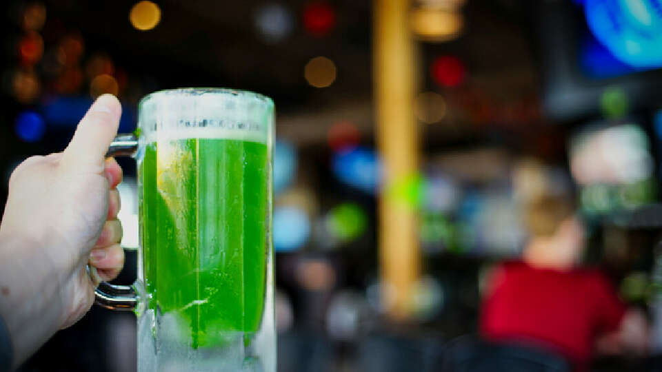 People celebrate St. Patrick Day with drinking green beer.