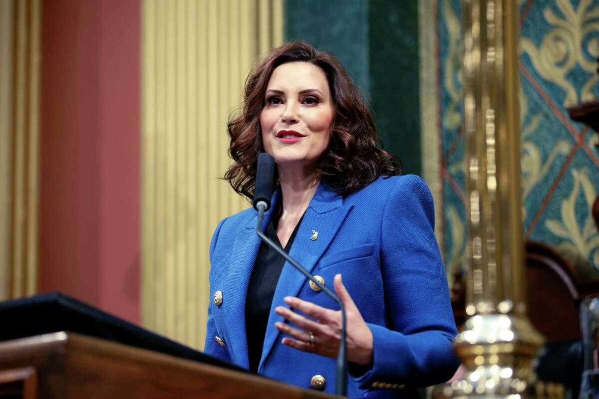 FILE - Michigan Gov. Gretchen Whitmer delivers her State of the State address to a joint session of the House and Senate, Jan. 25, 2023, at the state Capitol in Lansing, Mich. Whitmer signed legislation Thursday, March 16, 2023, codifying LGBTQ protections into the state's civil rights law, permanently outlawing discrimination on the basis of sexual orientation or gender identity in the state.
