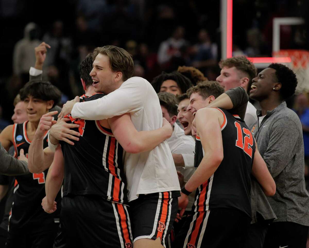 The Princeton Tigers celebrate after they defeated the Arizona Wildcats 59-55 in the first round 2023 NCAA Men’s Basketball tournament at Golden 1 Center in Sacramento.