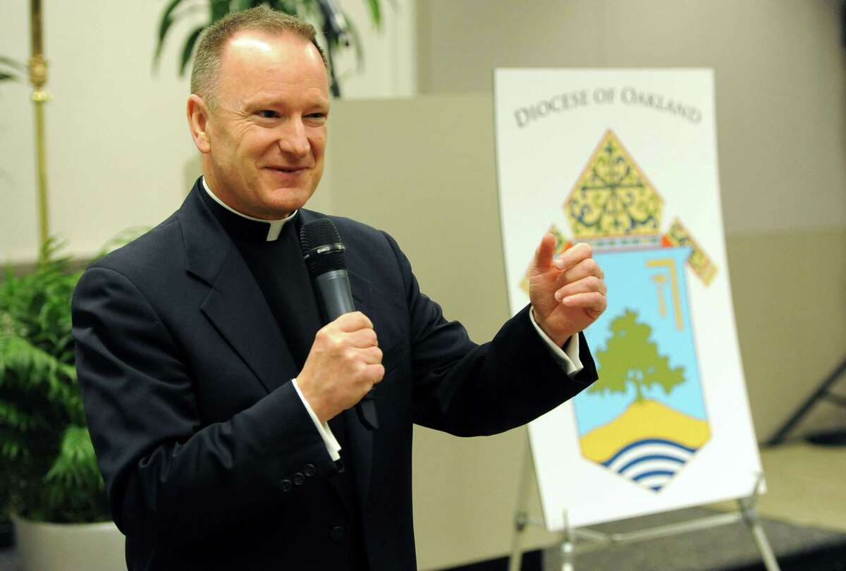 Oakland Bishop Michael Barber, shown speaking in 2013, says he believes bankruptcy “can provide a way to support all survivors in their journey toward healing in an equitable and comprehensive way.” 