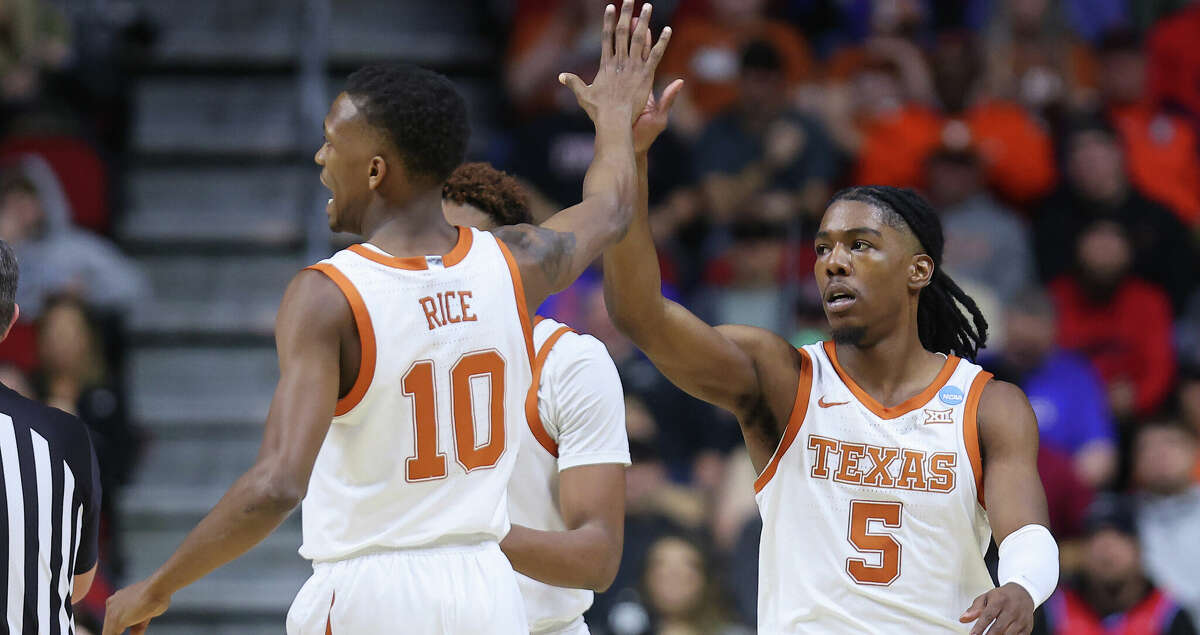 DES MOINES, IOWA - MARCH 16: Sir'Jabari Rice #10 and Marcus Carr #5 of the Texas Longhorns celebrates after a play during the first half against the Colgate Raiders in the first round of the NCAA Men's Basketball Tournament at Wells Fargo Arena on March 16, 2023 in Des Moines, Iowa. (Photo by Michael Reaves/Getty Images)