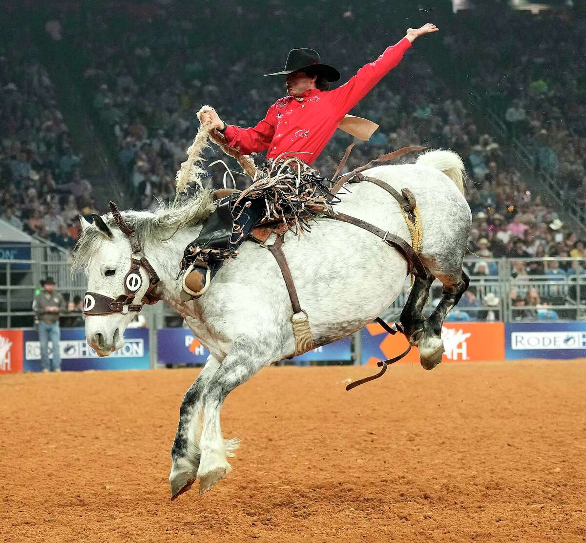 Kade Bruno rides Redial in the saddle bronc riding competition during the Semifinal 2 round of Rodeo Houston at the Houston Livestock Show and Rodeo at NRG Park on Thursday, March 16, 2023 in Houston.