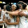 LAS VEGAS, NEVADA - OCTOBER 08: The Phoenix Mercury, including Skylar Diggins-Smith #4, Brianna Turner #21, Brittney Griner #42 and Diana Taurasi #3 celebrate after defeating the Las Vegas Aces 87-84 in Game Five of the 2021 WNBA Playoffs semifinals to win the series at Michelob ULTRA Arena on October 8, 2021 in Las Vegas, Nevada. NOTE TO USER: User expressly acknowledges and agrees that, by downloading and or using this photograph, User is consenting to the terms and conditions of the Getty Images License Agreement.