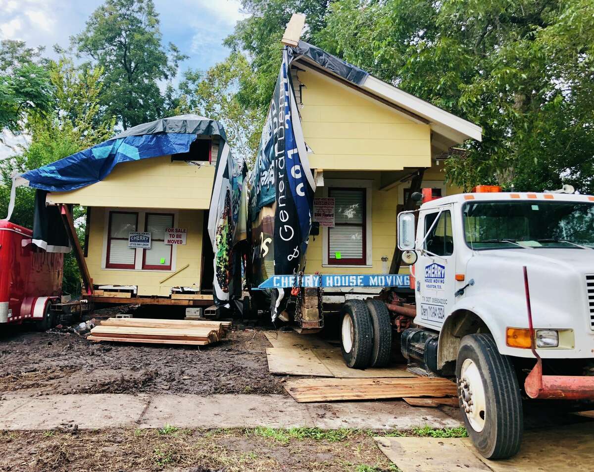 Why is the big blue Cohn house sitting in a Houston parking lot?