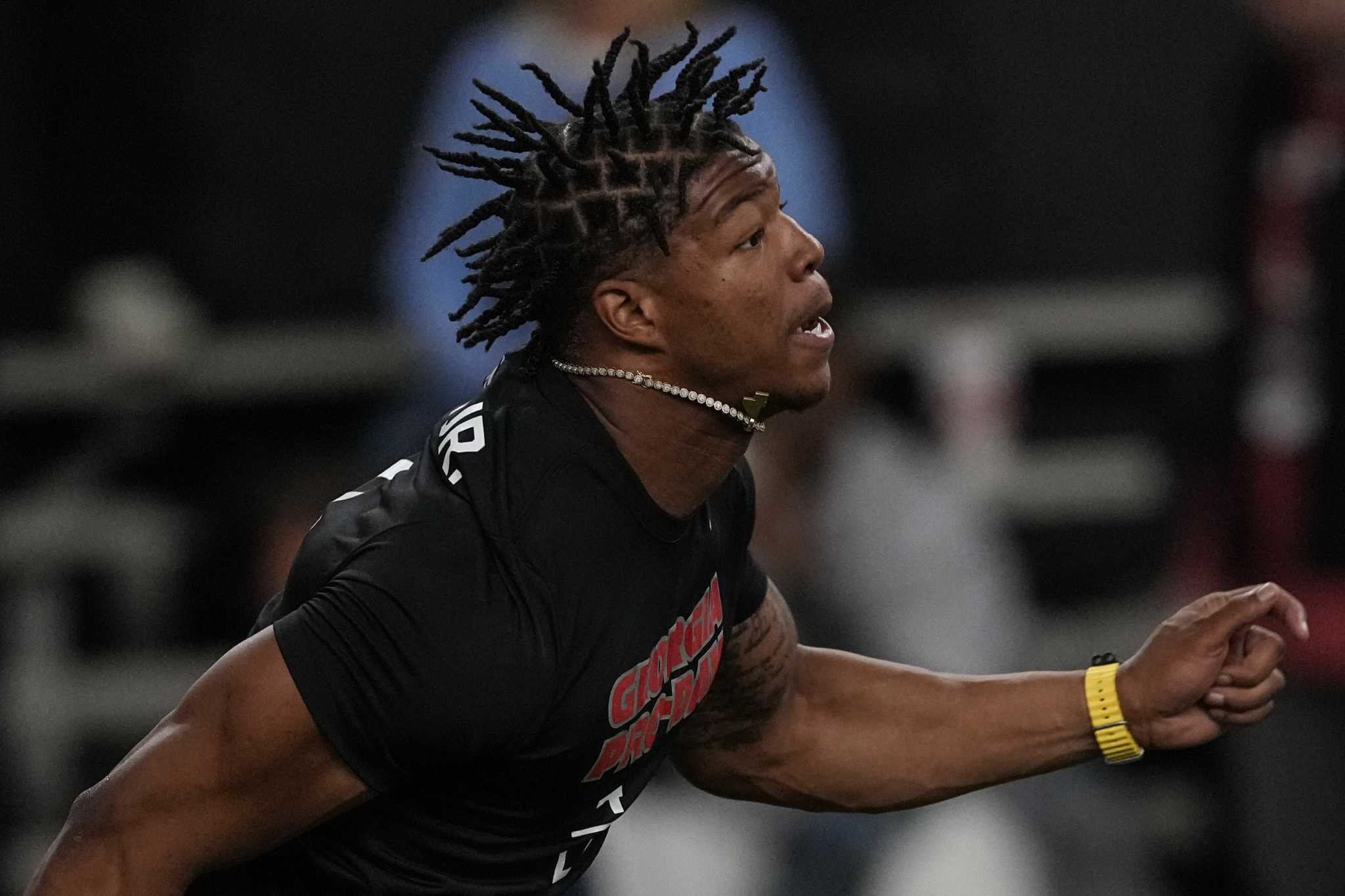 The Texans own the 12th overall pick in the 2023 NFL Draft, and the experts  are split over who they'll take. But Ohio State receiver Jaxon Smith-Njigba  was the most-mocked player to