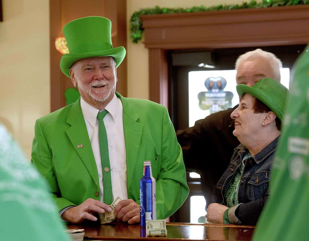 Phil Doran of Danbury and his wife, Ruth, are dressed to celebrate St. Patrick’s Day at the Greater Danbury Irish Cultural Center on Friday, March 17, 2023.