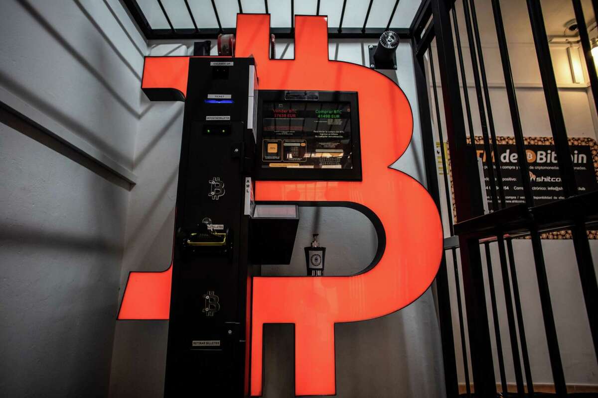A Bitcoin automated teller machine (ATM) in a kiosk in Barcelona, Spain, on Wednesday, March 9, 2022. Bitcoin dropped back below $40,000, erasing almost all the gains sparked by optimism about U.S. President Joe Biden's executive order to put more focus on the crypto sector.