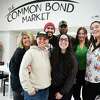 From left; Common Bond Market employees Theresa DeBenedetto, Diana Maione, Christian Hamilton, Hannah Brighindi, Angus Mondesir, Natalie Glidden, and Sabrina Amorando are banding together to try to keep the market open at 40 Huntington Street in Shelton, Conn on Friday, March 17, 2023.