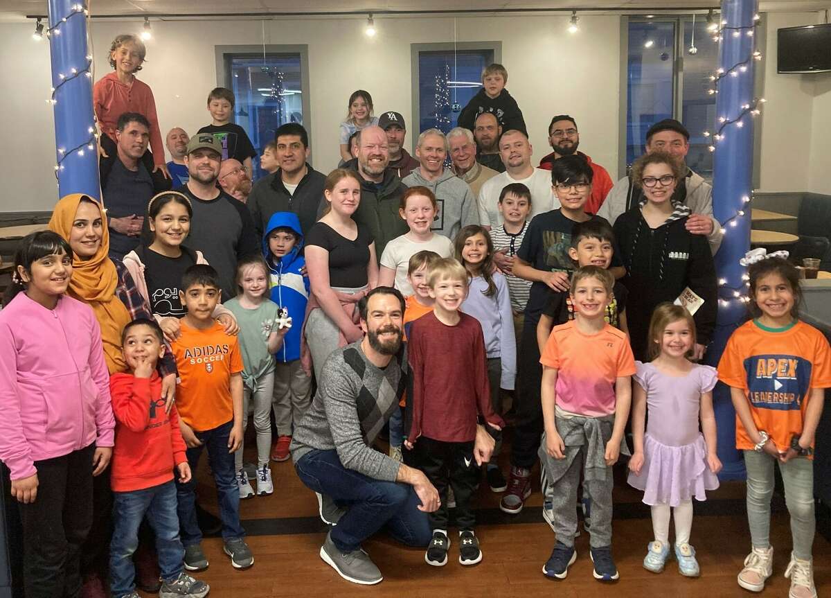 All Pro Dad is a monthly gathering of fathers and their kids with the purpose of growing closer while enjoying dinner and participating in meaningful activities. This is the gathering of fathers and their children at the All Pro Dad program's meeting on March 13 in New Milford.
