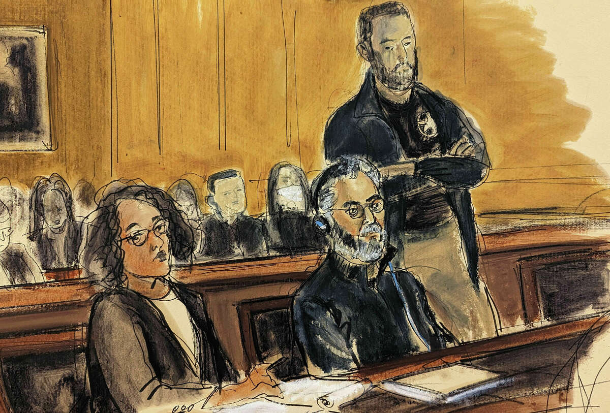 In this courtroom sketch, Guo Wengui, seated center, and his attorney Tamara Giwa, left, appear in federal court in New York, Wednesday, March 15, 2023. Guo, the business tycoon long sought by the government of China and known for cultivating ties to Trump administration figures, including Steve Bannon, was arrested Wednesday in New York on charges that he oversaw a $1 billion fraud conspiracy.