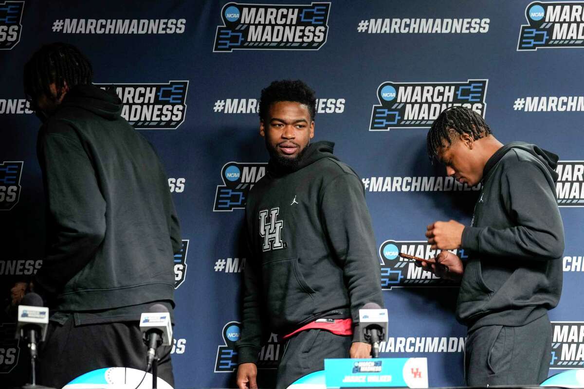 Houston’s Jarace Walker, left, Jamal Shead and Marcus Sasser walk off the stage at the end of a news conference ahead of a second-round college basketball game in the NCAA Tournament on Friday, March 17, 2023, in Birmingham, Ala. Houston plays Auburn in a second-round matchup.