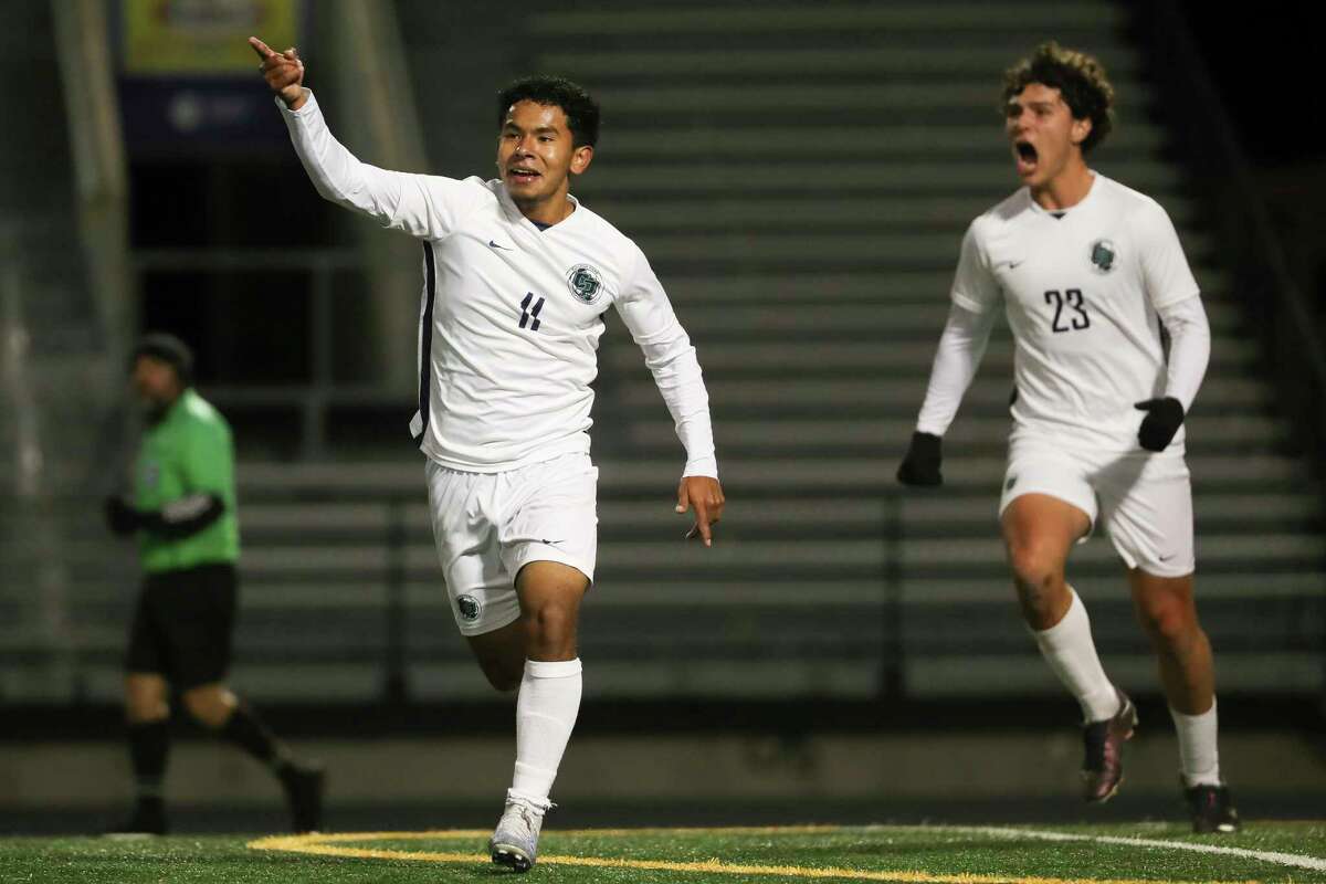 College Park's Eduin Funez (11) celebrate after scoring a goal during the first half of a District 13-6A high school soccer match at Conroe High School, Friday, March 17, 2023, in Conroe.