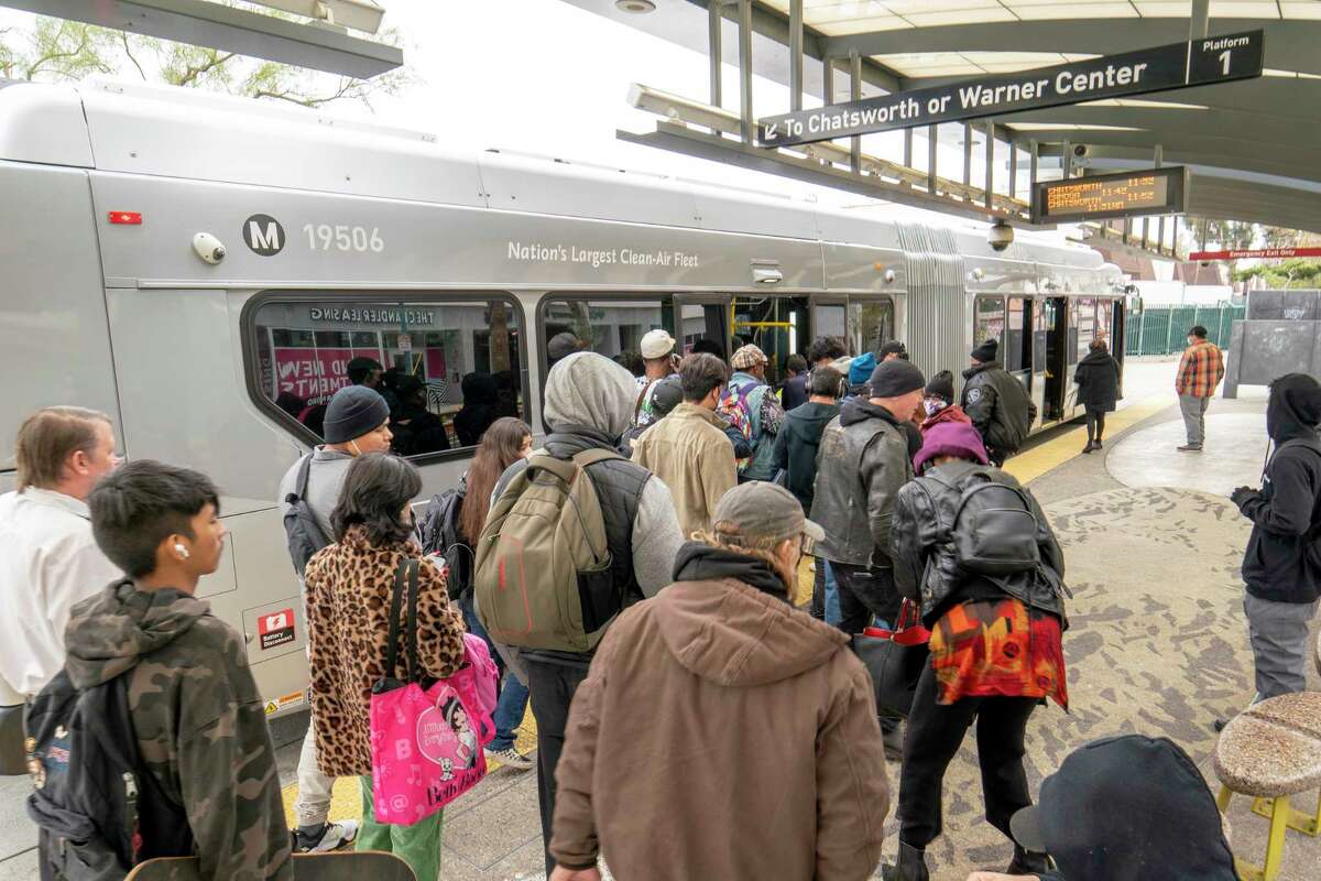 Passengers wait to board the Los Angeles Metro Orange Line in North Hollywood. Los Angeles has surpassed San Francisco in per-capita transit ridership.