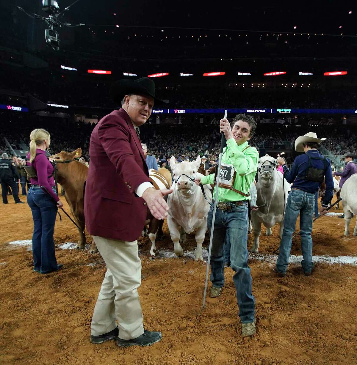 Stiles Patin reacts after his steer won Grand Champion during the Junior Market Steer Selection at the Houston Livestock Show and Rodeo at NRG Stadium on Friday, March 17, 2023 in Houston.