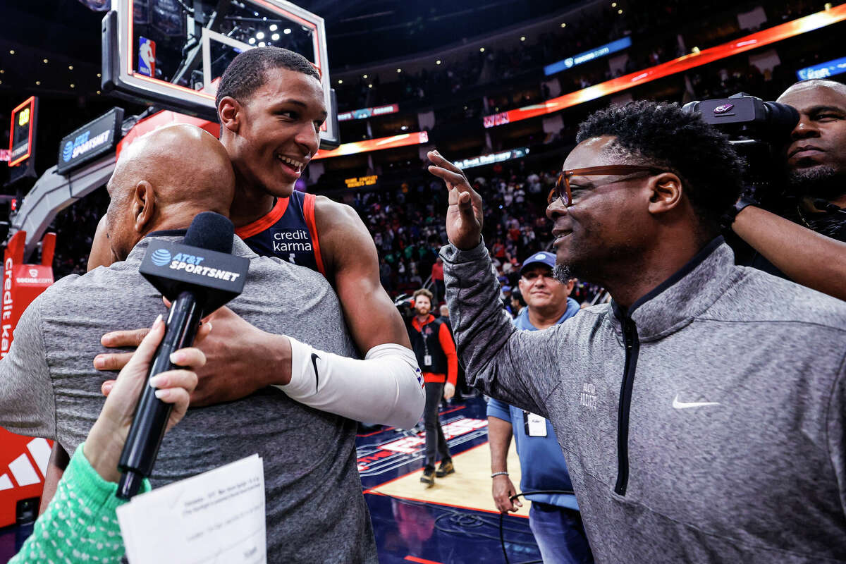 HOUSTON, TEXAS - MARCH 17: Jabari Smith Jr. #1 of the Houston Rockets celebrates with teammates after hitting the game winning shot to defeat the New Orleans Pelicans 114-112 at Toyota Center on March 17, 2023 in Houston, Texas. NOTE TO USER: User expressly acknowledges and agrees that, by downloading and or using this photograph, User is consenting to the terms and conditions of the Getty Images License Agreement. (Photo by Carmen Mandato/Getty Images)