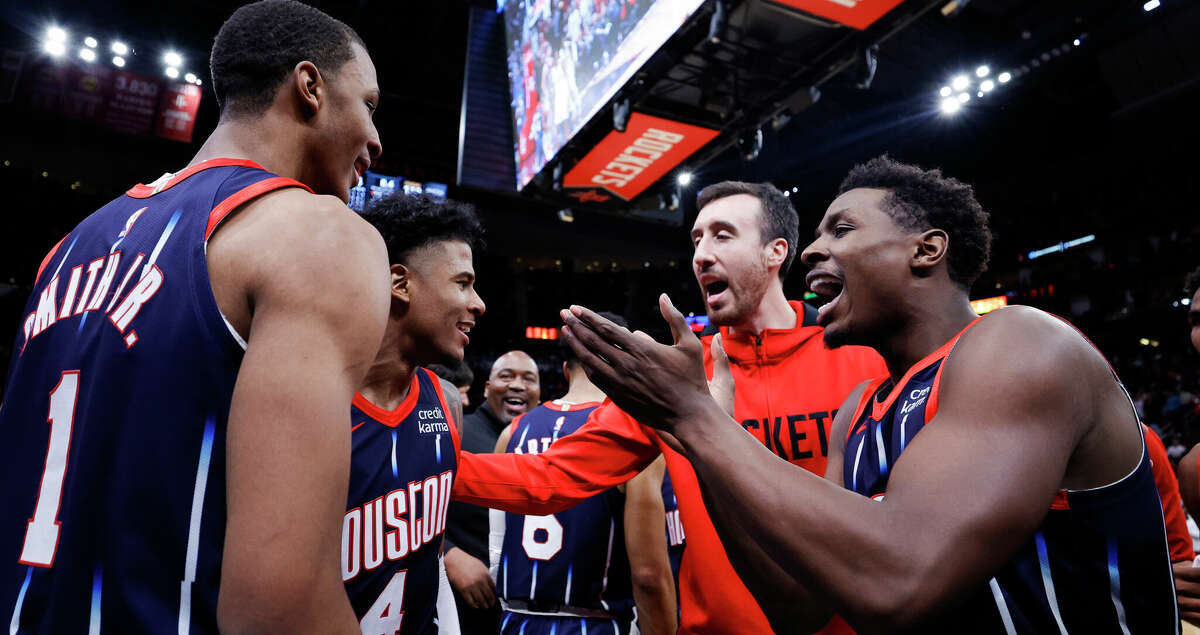 Jabari Smith Jr. #1 of the Houston Rockets celebrates with teammates after hitting the game winning shot to defeat the New Orleans Pelicans 114-112 at Toyota Center on March 17, 2023 in Houston, Texas. (Photo by Carmen Mandato/Getty Images)