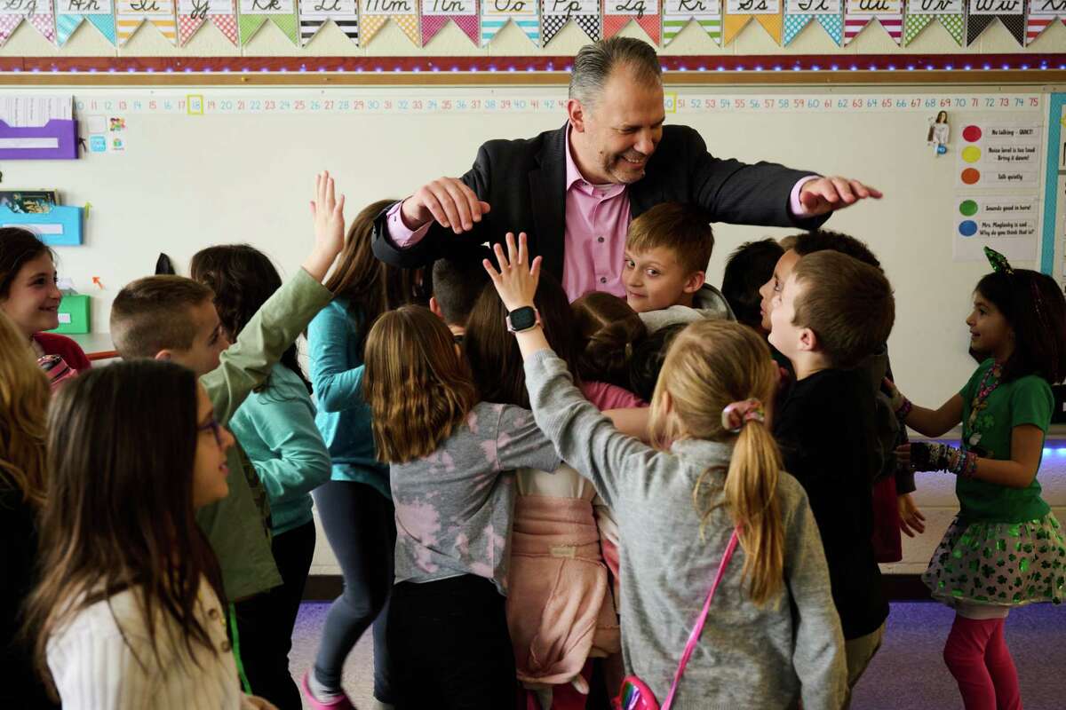 Superintendent Craig Heath with students at Hopkins Elementary in Mentor on March 14. (Dustin Franz for The Washington Post)