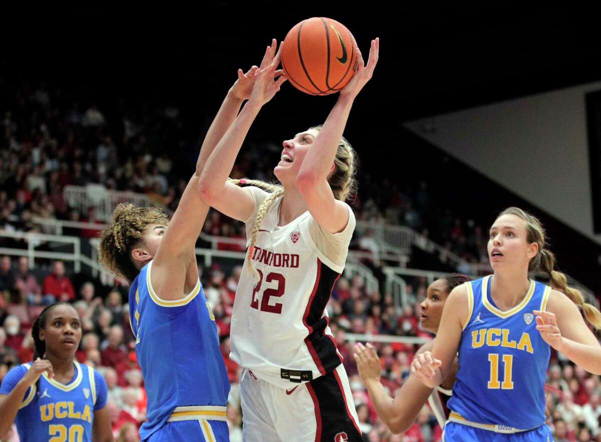 Cameron Brink (22) shoots Kiki Rice (1) In the second half as the Stanford Cardinal women played the UCLA Bruins at Maples Pavilion in Stanford, Calif., on Monday, February 20, 2023.