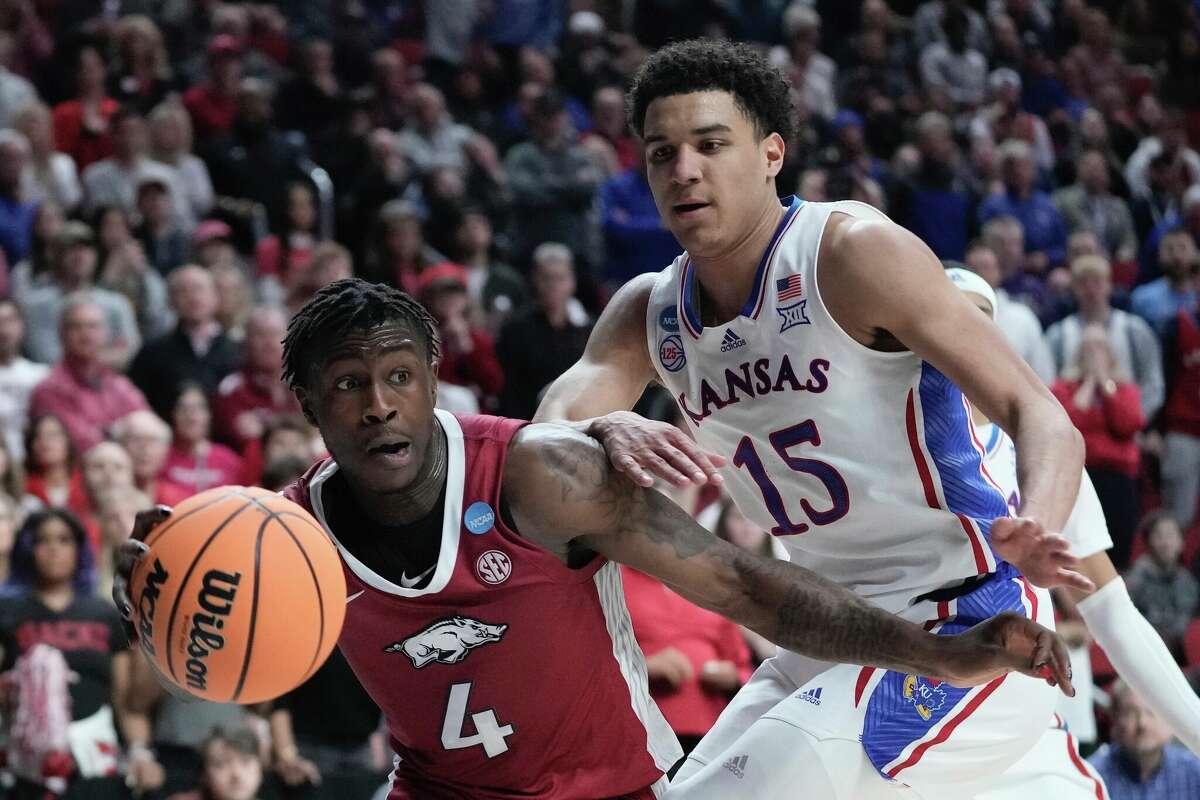 Upstart Arkansas knocks off top-seed Kansas in NCAA Tournament