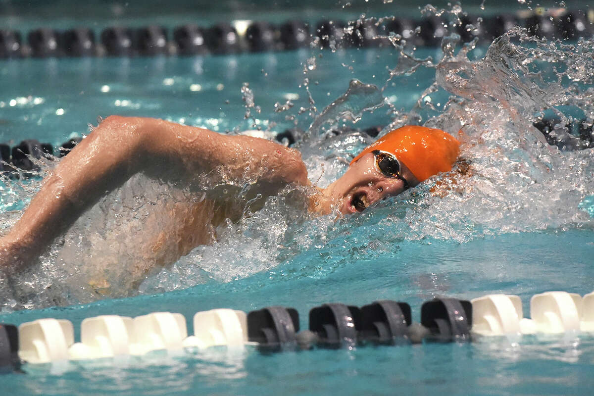 Ridgefield's Jack Clancy competes in the 500-yard freestyle at the CIAC State Open boys swimming championship at Yale in New Haven on Saturday, March 18, 2023.