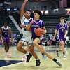 Catholic Central's Sei'Mir Roberson, right, drives to the basket against Westhill's Shawn Mayes during the NYSPHSAA Class B Boys Basketball Championship final in Glens Falls, N.Y., Sunday, March 19, 2023. Catholic Central’s season ended with a 66-61 loss to Westhill-III. (Adrian Kraus / Special to the Times Union)