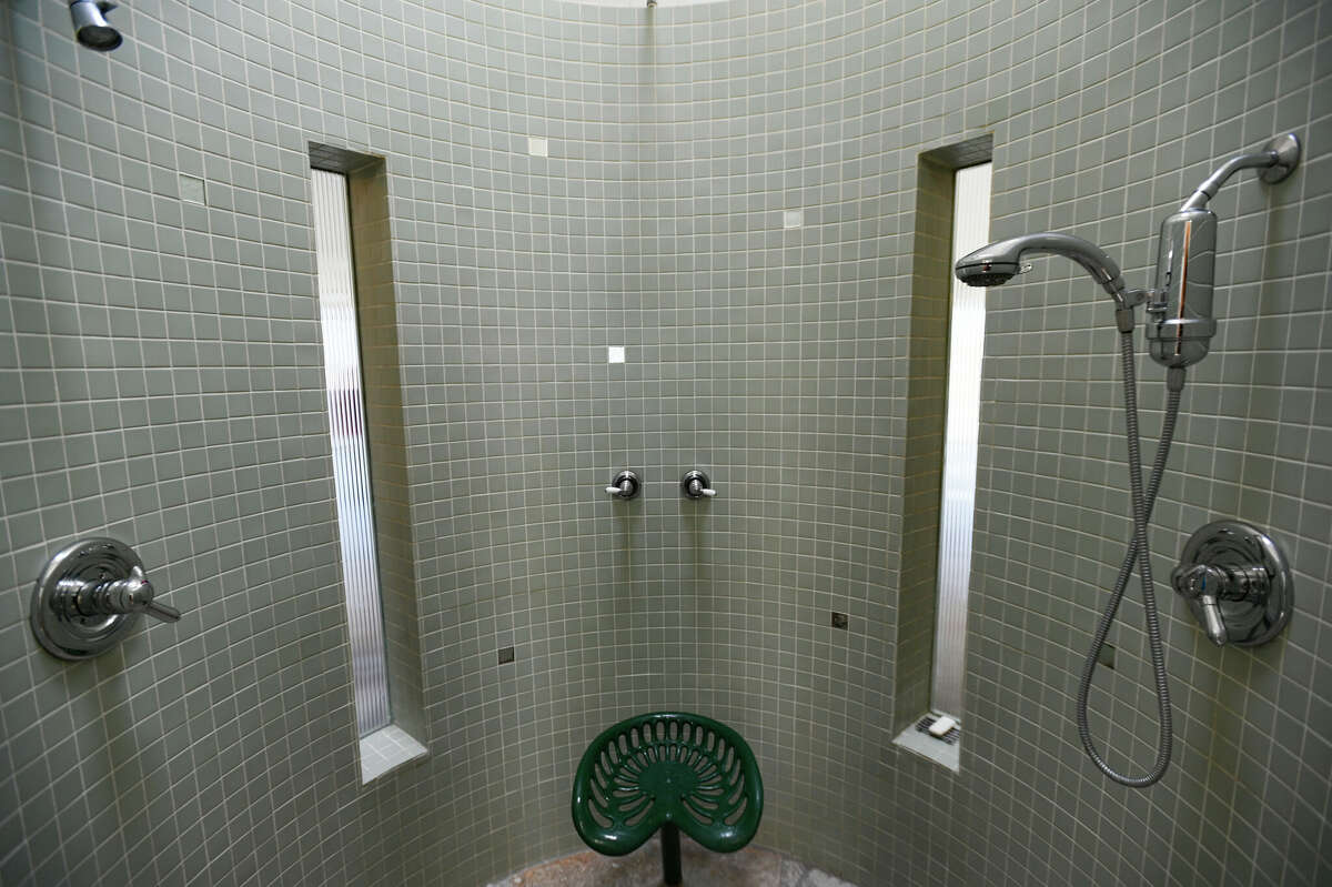 The barrel-shaped shower makes a unique design feature.