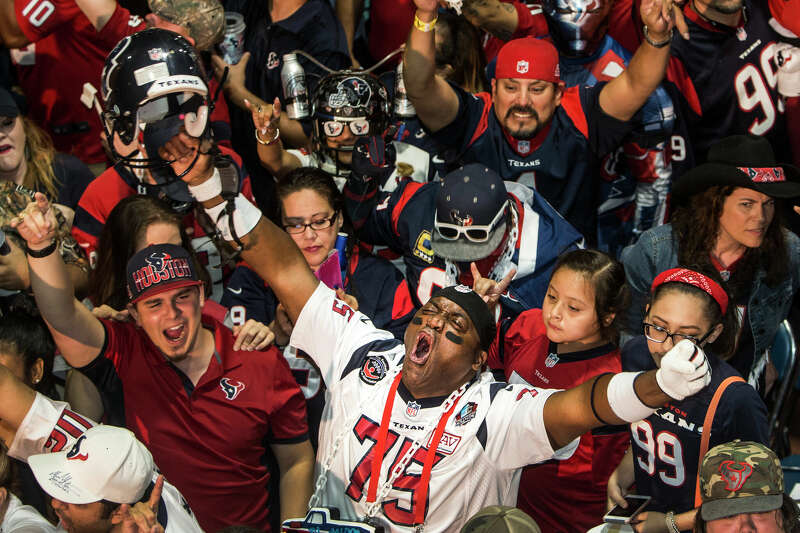 Houston Texans fans react to the Texans selection of Notre Dame wide receiver Will Fuller during the Texans draft party at NRG Stadium on Thursday, April 28, 2016, in Houston.