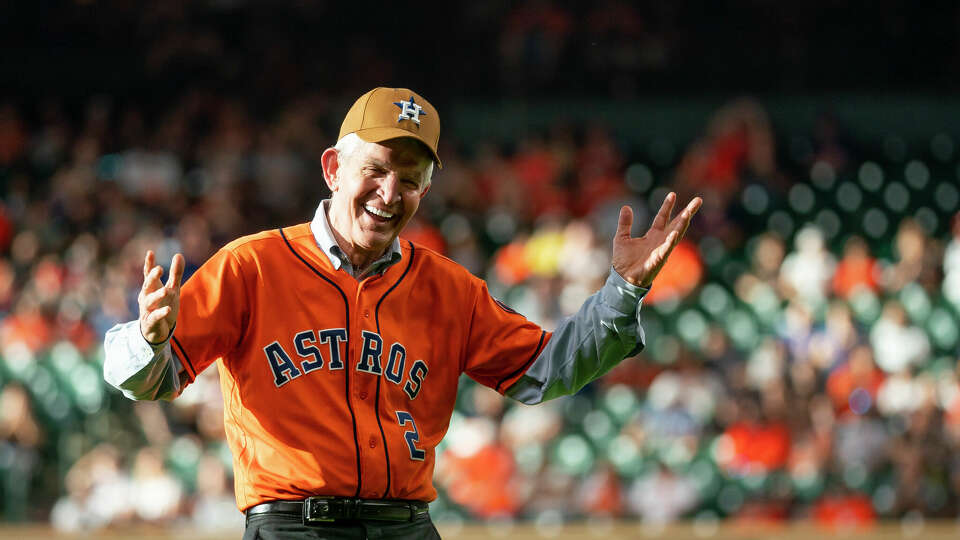 Jim McIngvale, 'Mattress Mac,' reacts after throwing out the first pitch before a game between the Houston Astros and Texas Rangers on Friday, July 23, 2021, at Minute Maid Park in Houston.