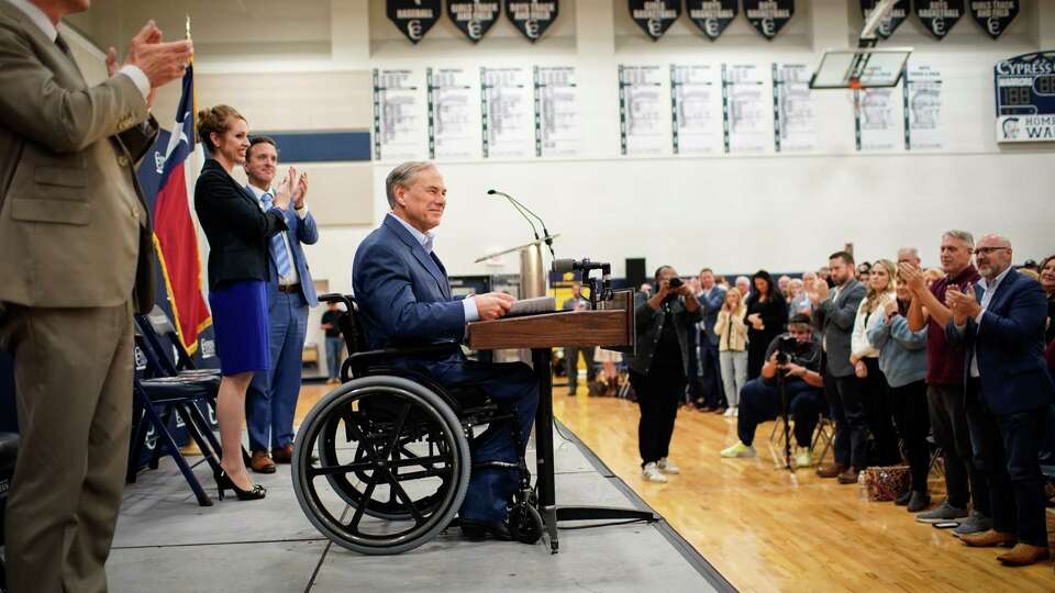 Gov. Greg Abbott speaks about a school voucher plan during a rally Tuesday March 21, 2023, at Cypress Christian School in Houston. Abbott and his allies say the voucher effort is about school choice. Critics say they are private school vouchers that allow people to take money out of the public school system to benefit private schools.