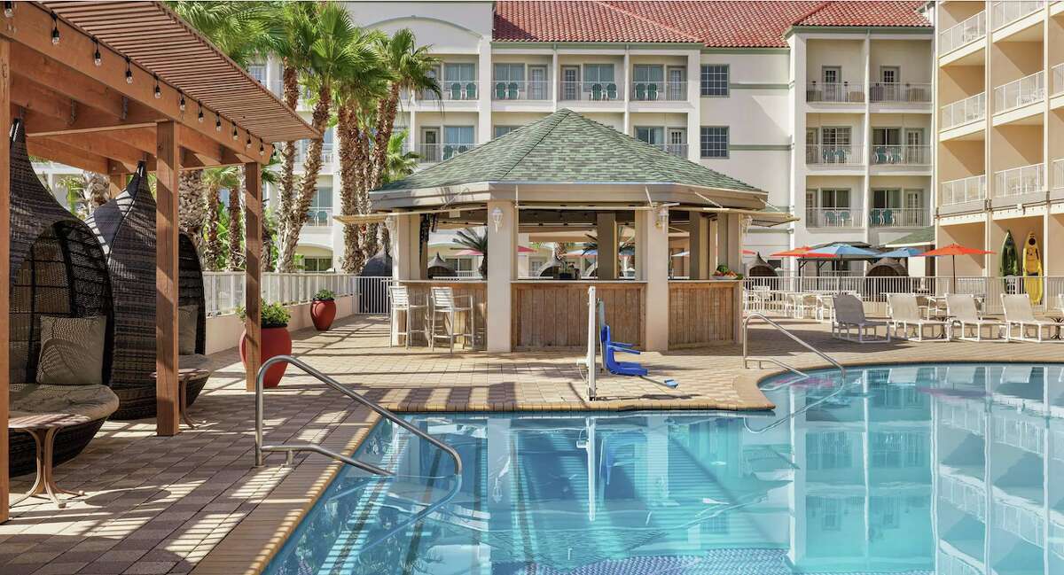 Enjoy cabanas and views of the Gulf from the pool at Hilton Garden Inn South Padre Island Beachfront.