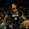 D.J. Augustin #14 of the Houston Rockets dribbles the basketball looking to pass against the Milwaukee Bucks at Fiserv Forum on December 22, 2021 in Milwaukee, Wisconsin.