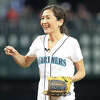 ESPN Analyst Mina Kimes reacts after throw out the ceremonial first pitch before the game between the Seattle Mariners and Boston Red Sox on June 10, 2022.