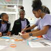About 100 Beaumont ISD middle school students participate in ExxonMobil's "Introduce a Girl to Engineering Day," in the Lamar University Science and Technology Building, Thursday. Photo taken March 23, 2023. Photo by Olivia Malick/The Enterprise