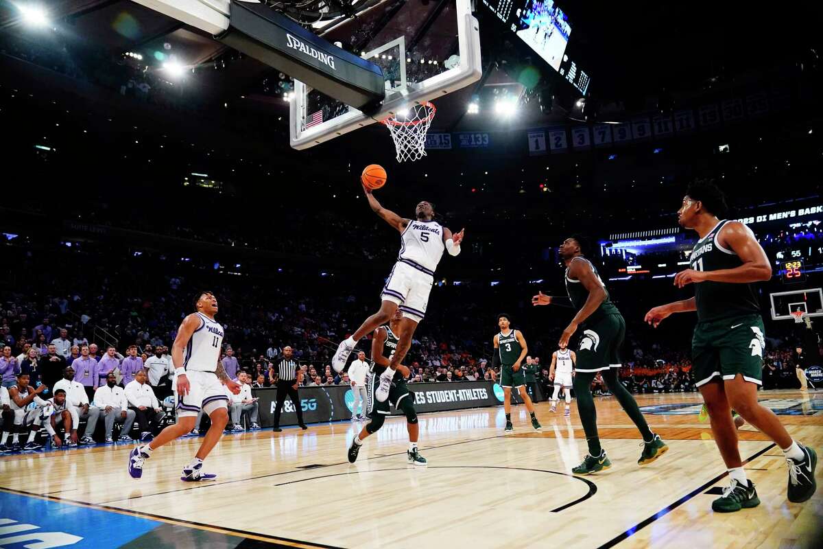 Kansas State guard Cam Carter (5) attempts a layup in the second half of a Sweet 16 college basketball game against Michigan State in the East Regional of the NCAA tournament at Madison Square Garden, Thursday, March 23, 2023, in New York.