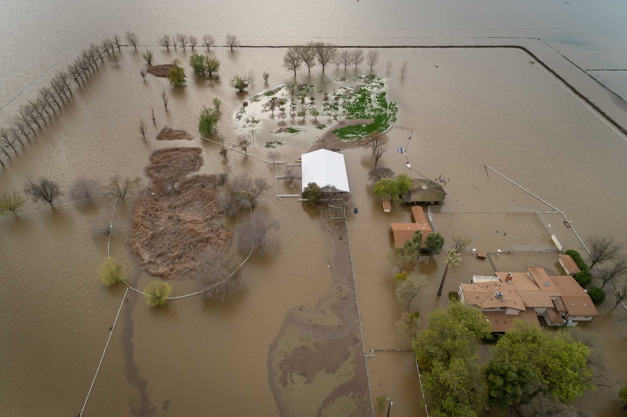 Lost California lake reemerges after storms, swamping towns and farms - Vimarsana News