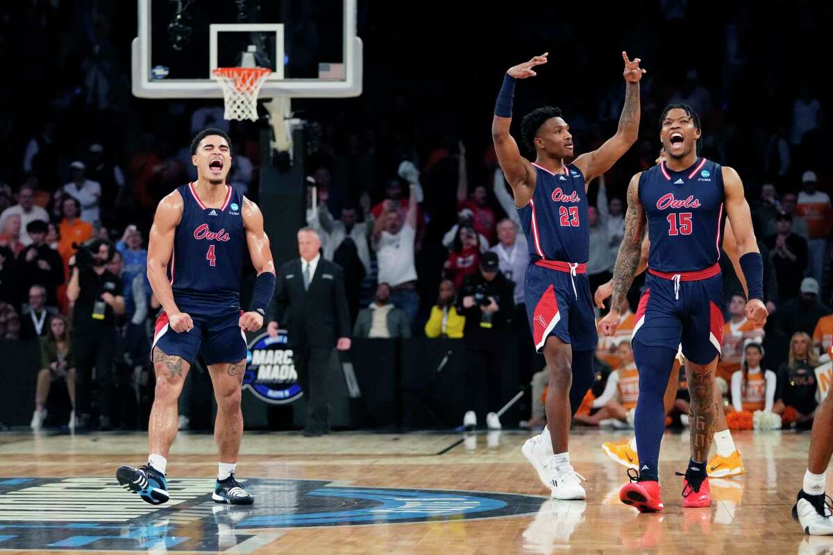 Florida Atlantic guards Bryan Greenlee (4), Brandon Weatherspoon (23) and Alijah Martin (15) react after the team defeated Tennessee 62-55 in a Sweet 16 college basketball game in the East Regional of the NCAA tournament at Madison Square Garden, Thursday, March 23, 2023, in New York.
