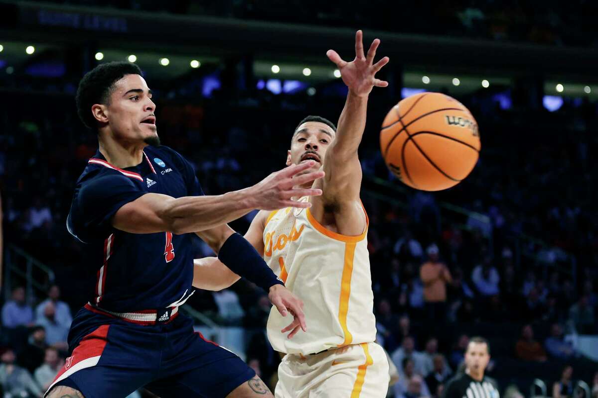 Florida Atlantic guard Bryan Greenlee (4) passes as Tennessee guard B.J. Edwards (1) defends during the first half of a Sweet 16 college basketball game in the East Regional of the NCAA tournament at Madison Square Garden, Thursday, March 23, 2023, in New York.