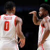 Marcus Sasser #0 and Jamal Shead #1 of the Houston Cougars talk on the court during the first half against the Auburn Tigers in the second round of the NCAA Men's Basketball Tournament at Legacy Arena at the BJCC on March 18, 2023 in Birmingham, Alabama.